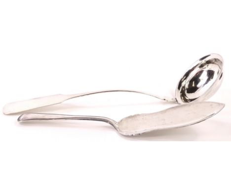 Two continental white metal items, to include a ladle stamped Nurnberg and a fish slice or server, possibly Danish. (2)