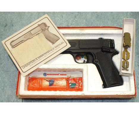 A Milbro Model G10 20-shot BB repeater air pistol with manual, in box and a set of brass sovereign scales, (2).