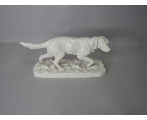A Royal Nymphenburg study, Irish setter, on ceramic base, 431 17 to underside.