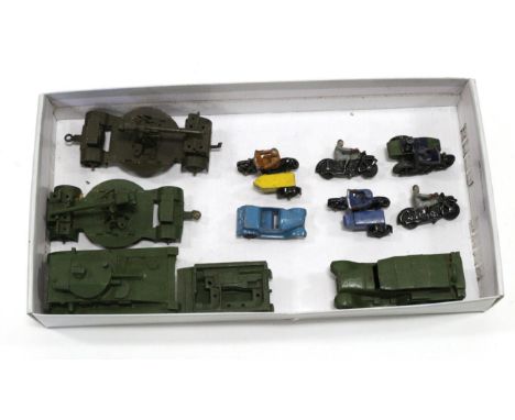 Dinky Military Medium tank (lacks tracks), Reconnaissance car, two Anti-aircraft guns and Light Dragon tractor (lacks tracks)