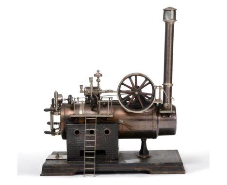 Doll & Cie An Impressive Stationary Steam Engine with horizontal boiler with single horizontal cylinder, twin flywheels and g