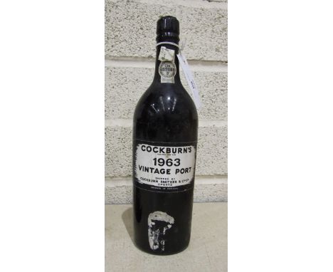 Cockburns 1963 Vintage Port, cork slightly raised, 1 bottle.