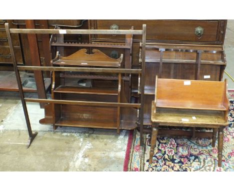 A mahogany three-tiered wall shelf, 69cm wide, 57cm high, three other sets of wall shelves, a stool, a bookrack and a towel r