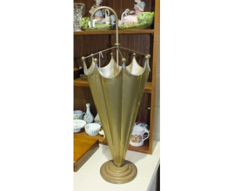 A lacquered brass umbrella-shaped umbrella/stick stand on circular stepped base, 74cm high.