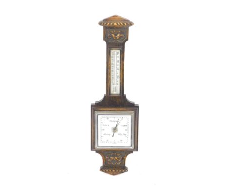 An early 20thC oak cased barometer, with a square dial, and thermometer, the case with foliate carving, 58.5cm H.