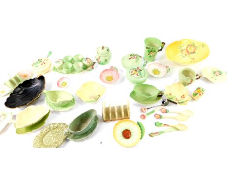Carltonware leaf moulded pottery, decorated with various floral patterns, including toast racks, egg cruet, preserve pots and