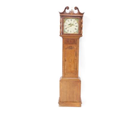 S Simpson of Oakham. A George III mahogany and oak longcase clock, the square enamel dial painted with a figure aside a churc