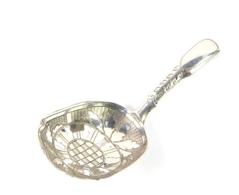 A George III silver caddy spoon, with a pierced foliate engraved and shaped bowl, Joseph Taylor Birmingham 1813, 0.21oz.