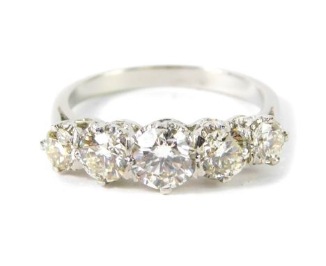 An 18ct gold and diamond five stone ring, approx 2.04ct, size P, 5.3g.