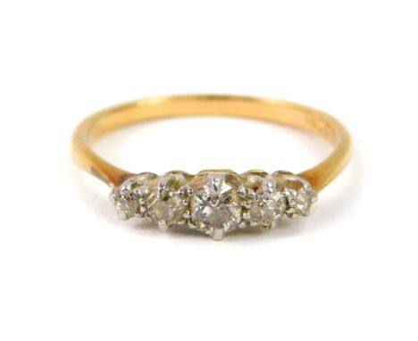 An 18ct gold and diamond five stone ring, approx 0.4cts, size N, 2.3g.