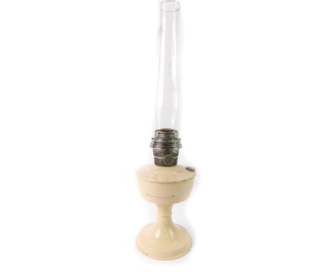 A Super Aladdin early 20thC cream painted metal oil lamp, with chimney, 60cm H. 