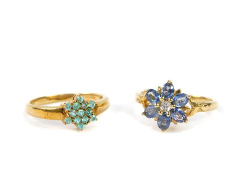 A 9ct gold sapphire and diamond set flower head ring, size N/O, with certificate, and a 9ct gold and paraiba tourmaline set f