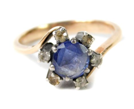 A sapphire and diamond ring, in a crossover floral design, set in rose yellow metal, size O, 3.9g.