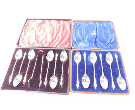 A set of six George V silver apostle tea spoons, cased, Sheffield 1933, and six Edward VII silver apostle tea spoons, and sug