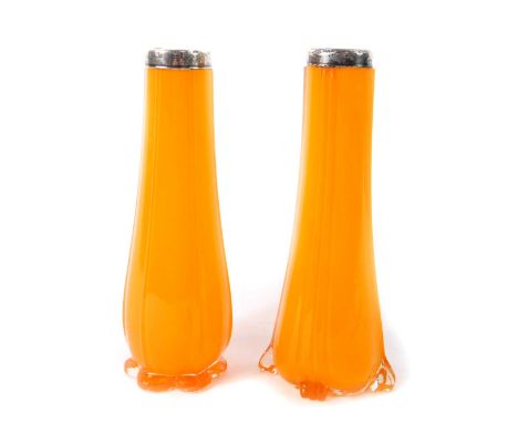 A pair of early 20thC orange glass vases, of vertical fluted teardrop form with silver rims, London 1932, 20.5cm H.