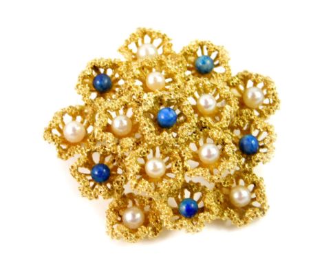 An 18ct gold seed pearl and turquoise brooch, of multi flower form, 13.4g.