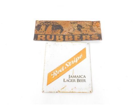 An enamel sign for Goodman's Rubbers, with cats, one wearing shoes, 20cm H,  52cm W., together with an enamel sign, Red Strip