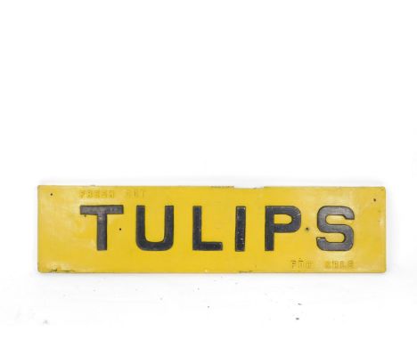 An enamel sign Fresh Cut Tulips For Sale, with raised black lettering against a yellow ground, 30cm H, 122cm W.