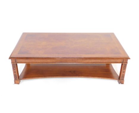 A Chippendale style burr yew wood and mahogany crossbanded occasional table, with herringbone inlay, the rectangular top rais