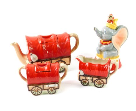 A Sadler pottery three piece covered wagon train tea set, comprising teapot, sucrier and cream jug, together with a Paul Card