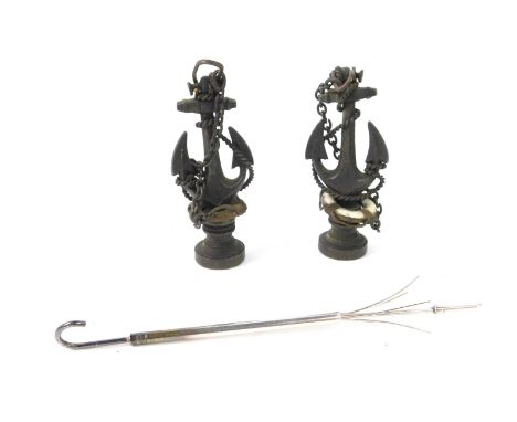 A pair of Victorian brass and enamel seals or pipe tampers, cast as furled anchors and life buoys, 7cm H, together with a ste