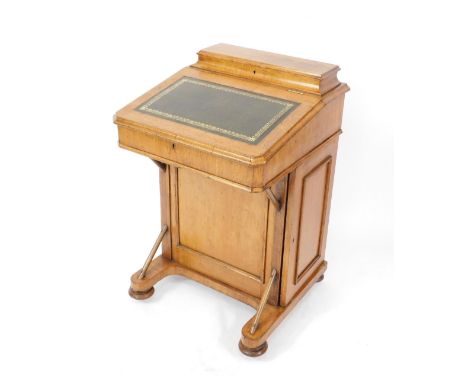 A Victorian light oak Davenport, with a fitted stationery top, hinged lid opening to reveal a burr maple interior, with four 