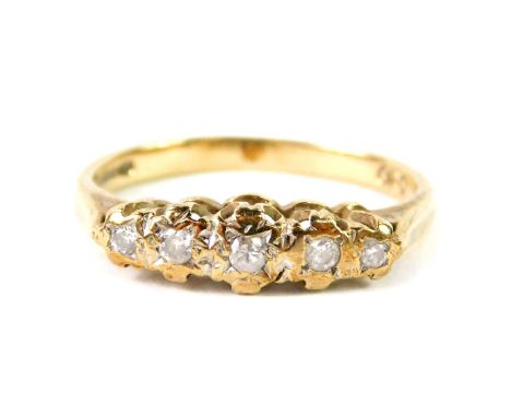 A 9ct gold and diamond five stone ring, illusion set, size L, 2.0g.