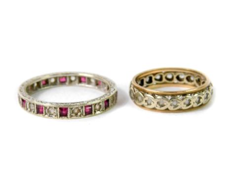 A 9ct white gold ruby and white sapphire full eternity ring, size W, and a further 9ct gold and white sapphire full eternity 