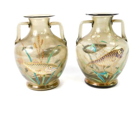 A pair of Continental late 19thC grey glass vases, of twin handled baluster form, enamel decorated with fish and river plant 