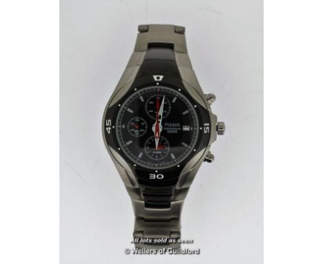 Gentlemen's Pulsar wristwatch, with black circular dial, baton hour markers, and three subsidiary dials, with white and red d