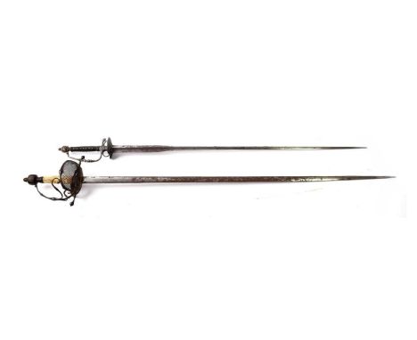 A 17th Century English Rapier, with 98.5cm double edge tapered steel blade, the iron hilt with finely pierced guard, recurvin