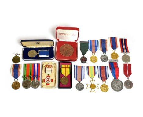 A Police Long Service and Good Conduct Medal (Elizabeth II), awarded to CONST. CECIL COLLINS, in case of issue; a Defence and