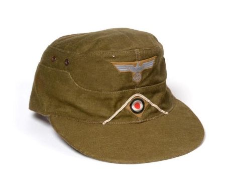 A German Third Reich EM's M41 Tropical Field Cap, in olive/khaki cotton, the front of the cap applied with a machine woven na