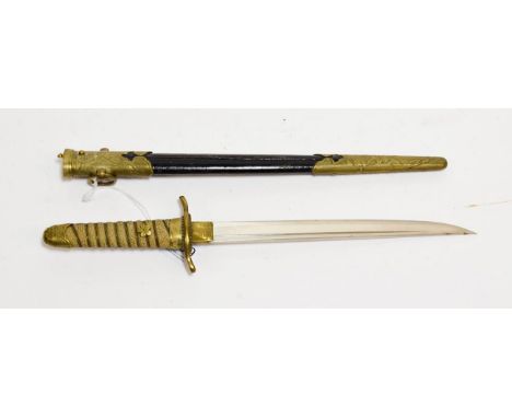 A Japanese Model 1883 Naval Dirk, the 21cm single edge steel blade with a narrow fuller to the back edge, with one piece bras