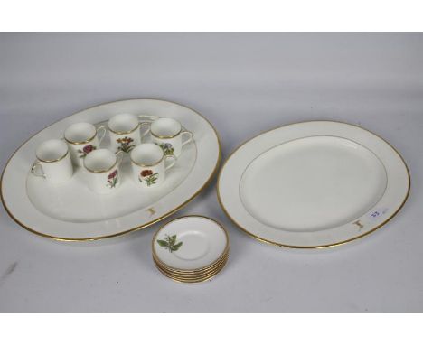 Two Cauldon China serving plates bearing Budge family crest and a set of six Royal Worcester coffee cans and saucers, each wi