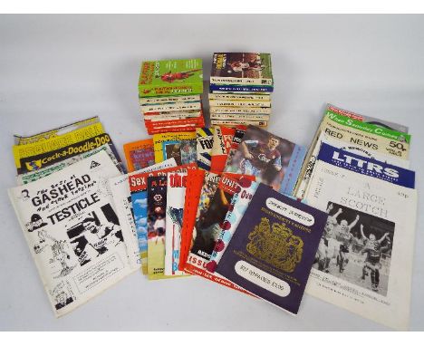 A mixed lot of national and regional football annuals and fanzines.