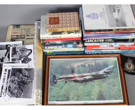 A collection of publications, predominantly relating to aircraft, RAF Bomber Command patch, RAF poster, 617 Squadron Dambuste