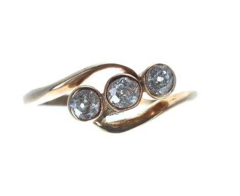 Antique 18ct three stone diamond cross-over design ring, Birmingham hallmark, round old-cuts in a rub-over setting, 0.30ct ap
