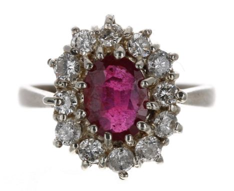 Impressive 18ct white gold ruby and diamond oval cluster ring, the ruby 1.53ct, round brilliant-cut diamonds 0.82ct approx, w