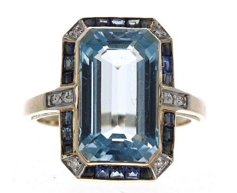 Attractive 9ct blue topaz, sapphire and diamond dress ring, width 18mm, 5.6gm, ring size N; with box 