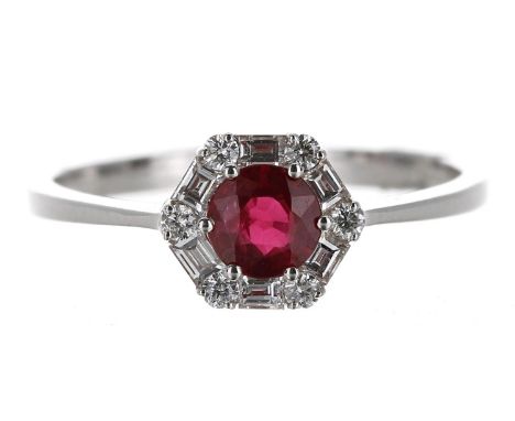 Good quality 18ct white gold ruby and diamond cluster ring, the ruby 0.60ct approx, 7mm, 2.4gm, ring size O; with box 