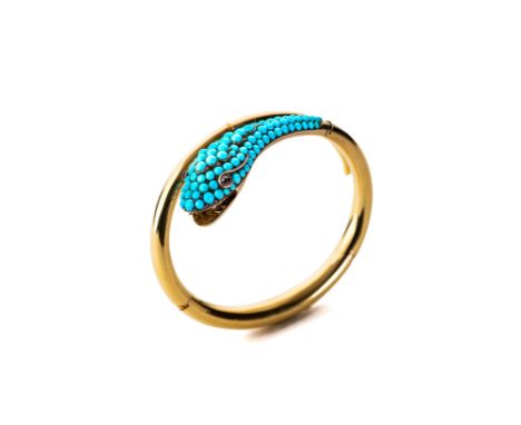 TURQUOISE AND GARNET SERPENT BANGLE, 1840s the hollow hinged bangle terminating in the head of a serpent, pavé set with polis