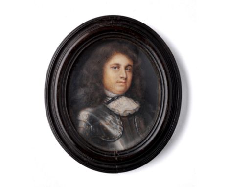 A PORTRAIT MINIATURE OF A GENTLEMAN, BY NICHOLAS (NATHANIEL) DIXON (c.1645-1708), CIRCA 1665 with long brown hair, wearing ar