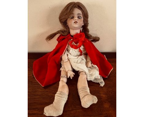 RED RIDING HOOD CHINA DOLL, JOINTED LIMBS, AS FOUND, AT FAULT, APPROX 43cm HEAD TO TOE