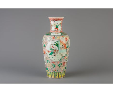 Title: A Chinese famille verte baluster shaped vase with floral design, Kangxi mark, 19th/20th C. Description: Dimensions:  H