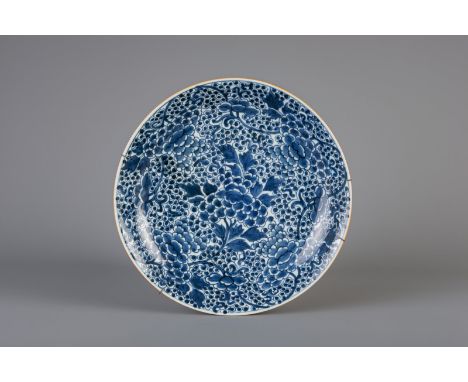Title: A Chinese blue and white charger with floral design, Kangxi Description: Dimensions:  Dia.: 38,2 cm   