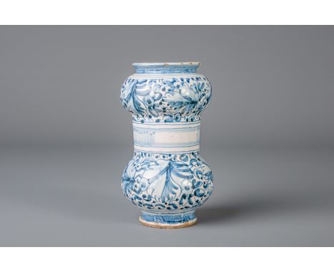Title: An Italian blue and white albarello with floral design, 17th/18th C. Description: Dimensions:  H 22,6 cm   