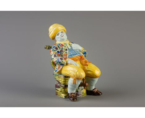 Title: A Dutch Delft polychrome figural 'Bobbejak' table fountain, 18th C. Description: Dimensions:  H 32 cm  Literature:  Ar