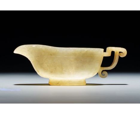 Title: A Chinese pale yellow jade libation cup, 19th C. Description: Dimensions:  9 x 4 x 3 cm