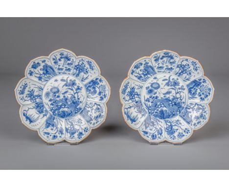 Title: A pair of Chinese blue and white lotus shaped plates with floral design, Kangxi Description: Dimensions:  Dia.: 22,5 c